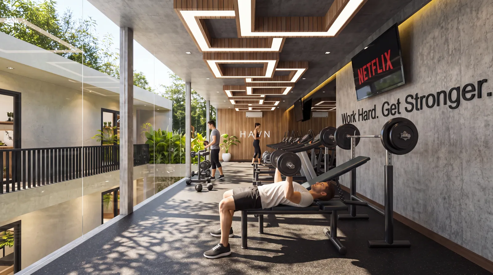 HAVN gym on the upper floor, looking out over the pool void